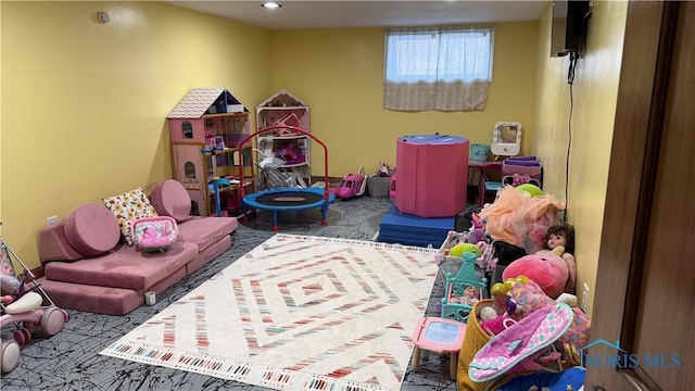 playroom with recessed lighting and carpet flooring