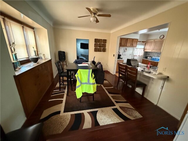 3250 Otto St, Toledo, OH 43608 - dining space with baseboards, dark wood-style floors, and ceiling fan