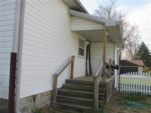 104 S Summit St, Edon, OH 43518 - entrance to property with fence