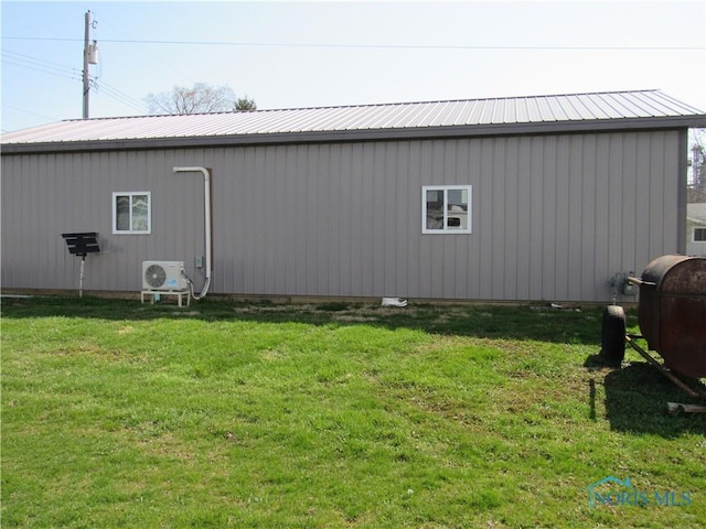 104 S Summit St, Edon, OH 43518 - view of pole building featuring a lawn and ac unit