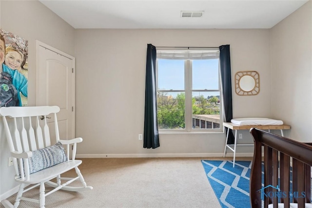 bedroom with visible vents, carpet flooring, and baseboards