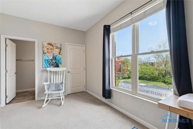 carpeted bedroom with baseboards