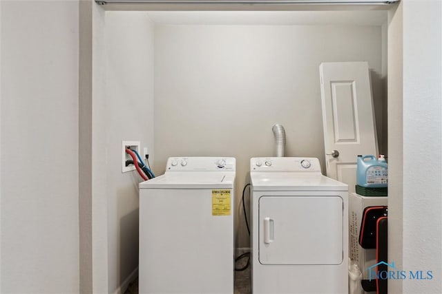 laundry area with laundry area and washer and dryer