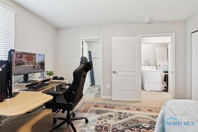 office area with carpet flooring and washing machine and dryer