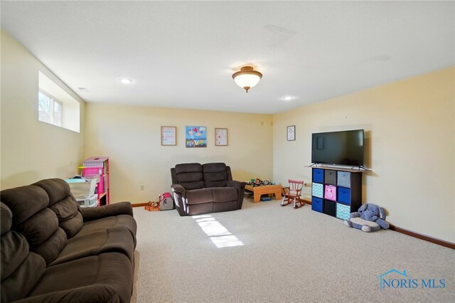 living room with recessed lighting, carpet, and baseboards