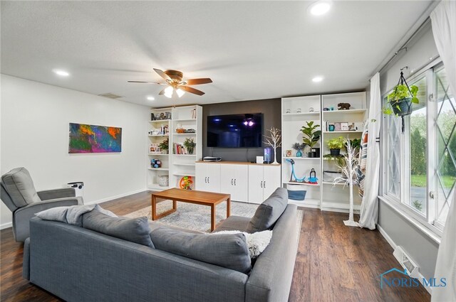 living area featuring recessed lighting, ceiling fan, and plenty of natural light