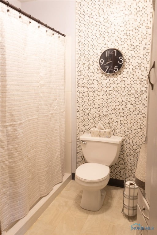 306 Lincoln St, Lyons, OH 43533 - full bath featuring toilet and curtained shower