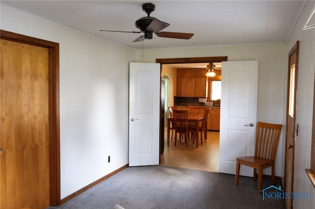 306 Lincoln St, Lyons, OH 43533 - sitting room featuring ceiling fan, baseboards, crown molding, and carpet floors