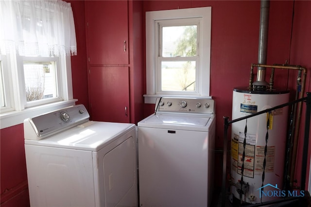 306 Lincoln St, Lyons, OH 43533 - laundry area with water heater, independent washer and dryer, and laundry area