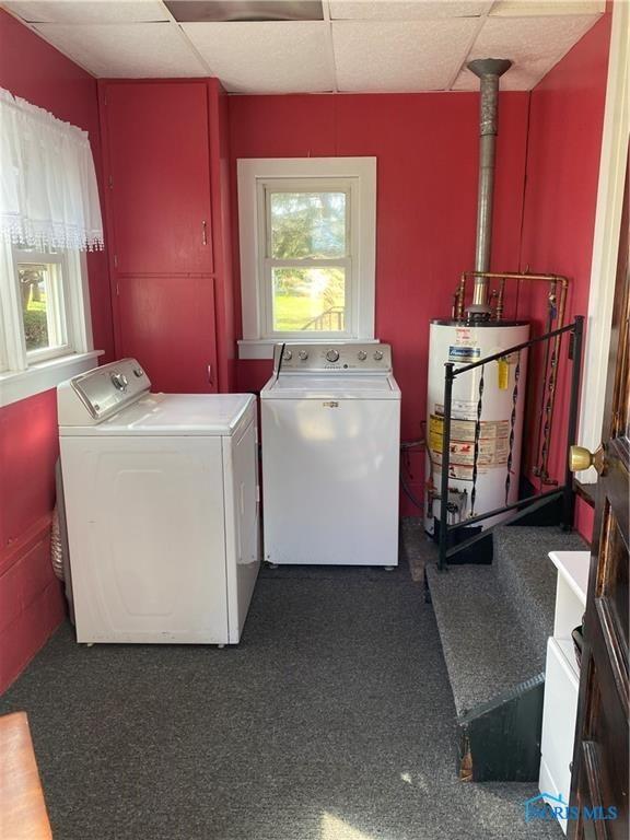 306 Lincoln St, Lyons, OH 43533 - laundry room with water heater and washer and clothes dryer