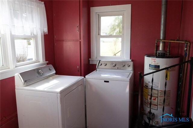306 Lincoln St, Lyons, OH 43533 - laundry room with gas water heater, washer and clothes dryer, and laundry area