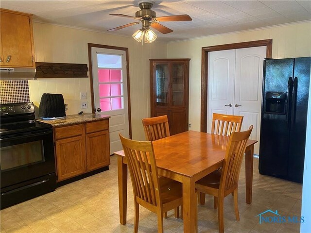 306 Lincoln St, Lyons, OH 43533 - dining area featuring crown molding, ceiling fan, and light floors