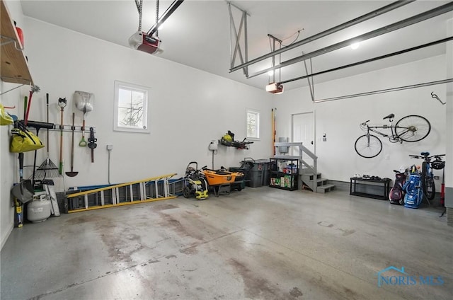 garage featuring a garage door opener