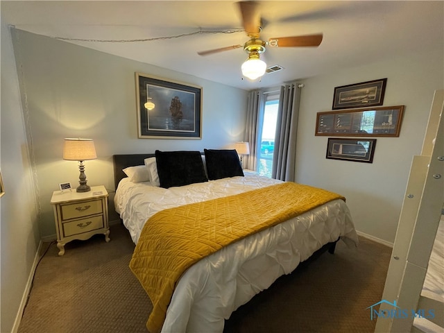 bedroom featuring baseboards, a ceiling fan, visible vents, and carpet floors