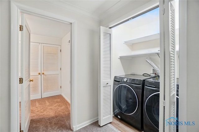 160 Winfield Dr, Bowling Green, OH 43402 - clothes washing area featuring baseboards, washing machine and clothes dryer, laundry area, and carpet floors