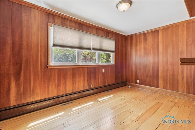 325 Park St, Bryan, OH 43506 - empty room featuring wooden walls and wood-type flooring