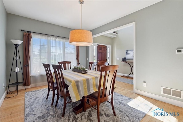 4218 Herdmans Cir, Maumee, OH 43537 - dining room with baseboards and wood-type flooring