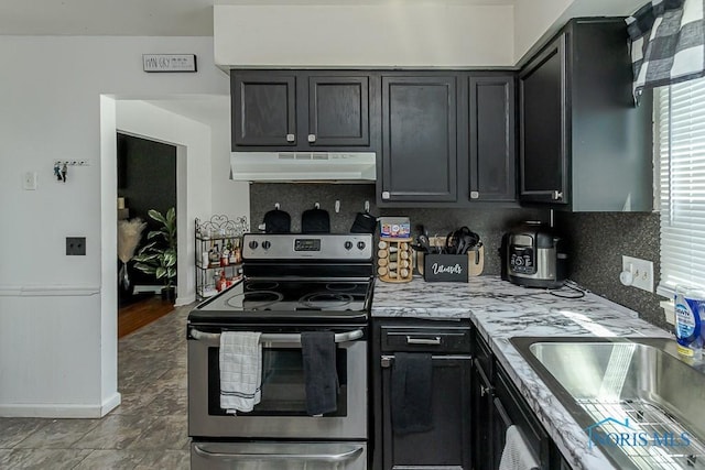 853 Circleview Dr, Toledo, OH 43615 - kitchen featuring a sink, under cabinet range hood, tasteful backsplash, and stainless steel electric range oven