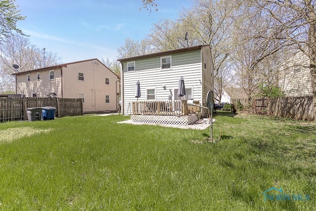 853 Circleview Dr, Toledo, OH 43615 - back of house featuring a lawn and a fenced backyard