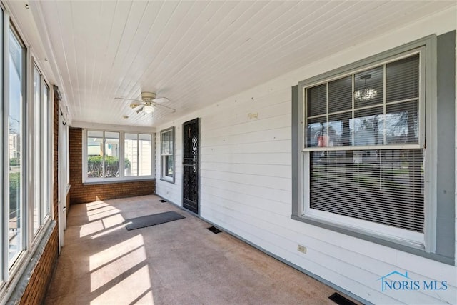 2000 Oakwood Ave, Toledo, OH 43607 - unfurnished sunroom featuring a ceiling fan and visible vents