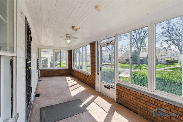 2000 Oakwood Ave, Toledo, OH 43607 - unfurnished sunroom featuring visible vents and a ceiling fan
