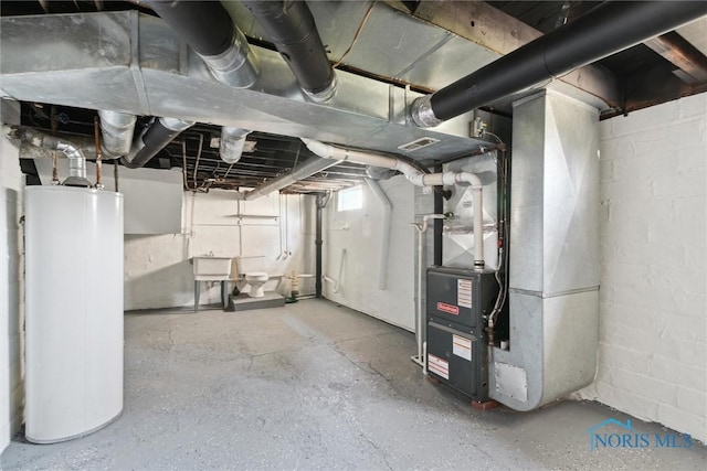 2000 Oakwood Ave, Toledo, OH 43607 - basement with heating unit and gas water heater