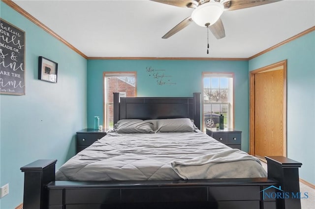 bedroom with a ceiling fan, baseboards, and crown molding