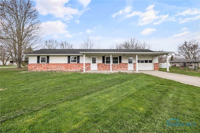 ranch-style home featuring brick siding, driveway, a front yard, and a garage
