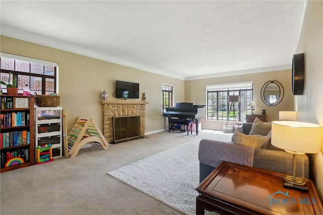 3122 Hopewell Pl, Toledo, OH 43606 - carpeted living area featuring ornamental molding, a stone fireplace, and baseboards