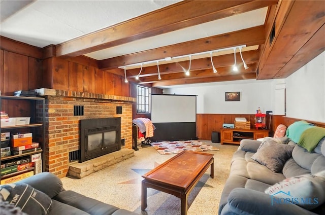 3122 Hopewell Pl, Toledo, OH 43606 - living room featuring wooden walls, a brick fireplace, wainscoting, and beam ceiling