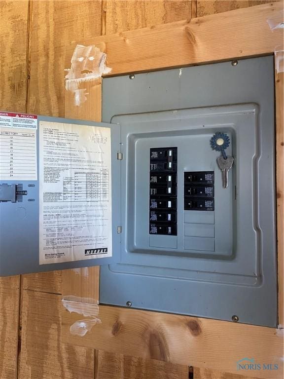 utility room featuring electric panel