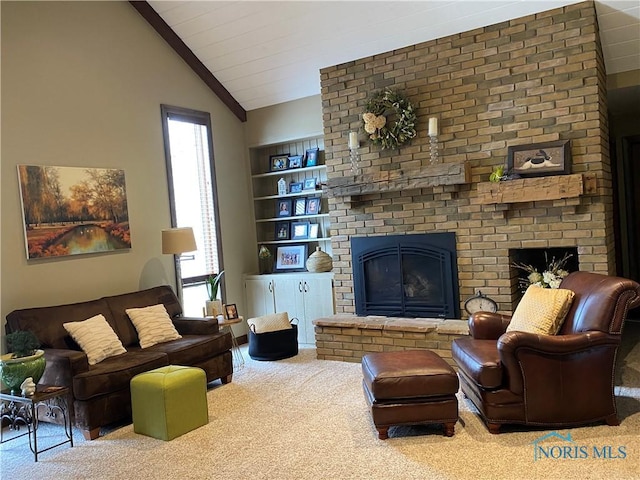 carpeted living room with vaulted ceiling, a brick fireplace, and built in shelves