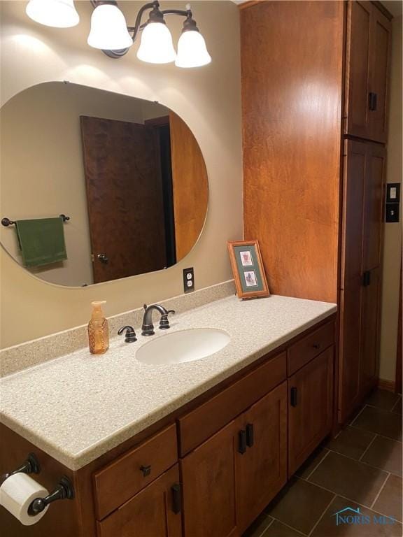 bathroom with vanity and tile patterned flooring