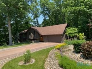 955 Greenbrier Rd, Upper Sandusky, OH 43351 - view of front of house with concrete driveway and a garage