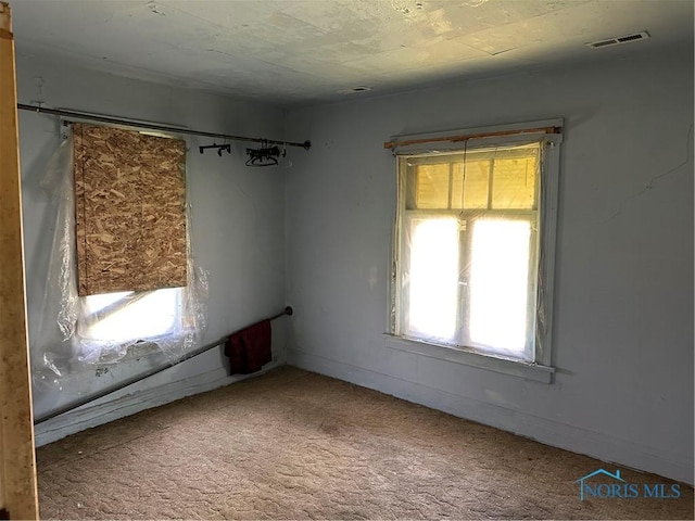 1331 Grand Ave, Toledo, OH 43606 - unfurnished room with visible vents and carpet