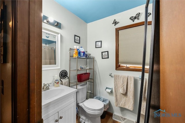 1705 Archwood Ln, Toledo, OH 43614 - full bath featuring toilet, visible vents, and vanity