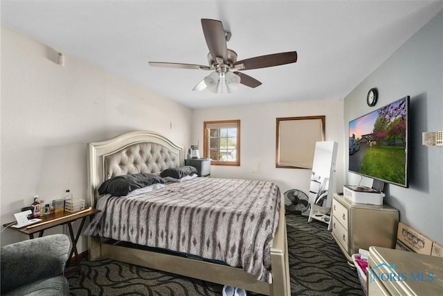 1705 Archwood Ln, Toledo, OH 43614 - bedroom with dark colored carpet and ceiling fan