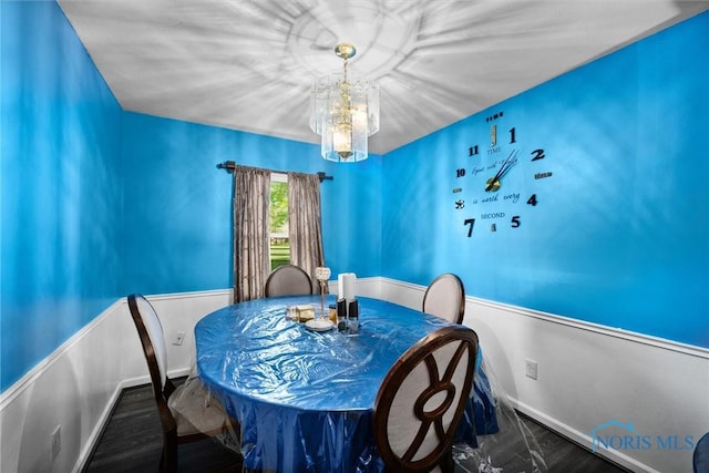 1705 Archwood Ln, Toledo, OH 43614 - dining room featuring baseboards and a chandelier