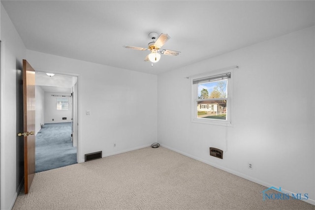 5148 Fern Dr, Toledo, OH 43613 - unfurnished room featuring carpet floors, a ceiling fan, baseboards, and visible vents