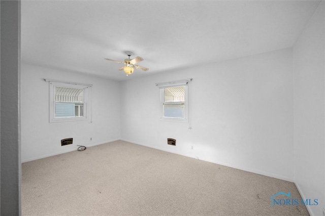 5148 Fern Dr, Toledo, OH 43613 - spare room with carpet flooring, a ceiling fan, and baseboards