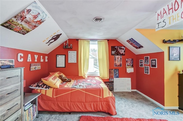 bedroom featuring baseboards, visible vents, lofted ceiling, and carpet