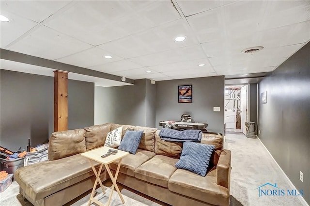 carpeted living room featuring recessed lighting and baseboards