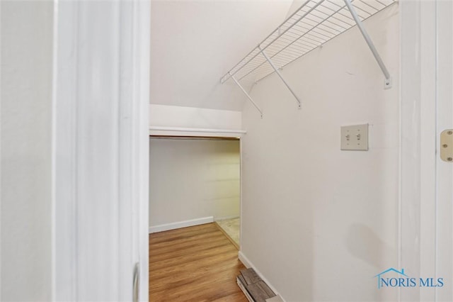 5718 Aspen Dr Unit 15, Toledo, OH 43615 - walk in closet with wood finished floors