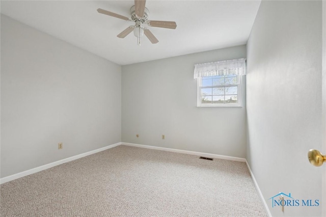 5718 Aspen Dr Unit 15, Toledo, OH 43615 - spare room featuring baseboards, carpet floors, and ceiling fan