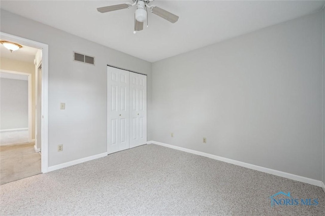 5718 Aspen Dr Unit 15, Toledo, OH 43615 - unfurnished bedroom featuring carpet flooring, ceiling fan, baseboards, visible vents, and a closet