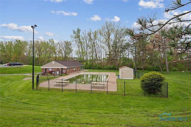 5718 Aspen Dr Unit 15, Toledo, OH 43615 - view of pool with a yard, fence, an outdoor structure, and a shed