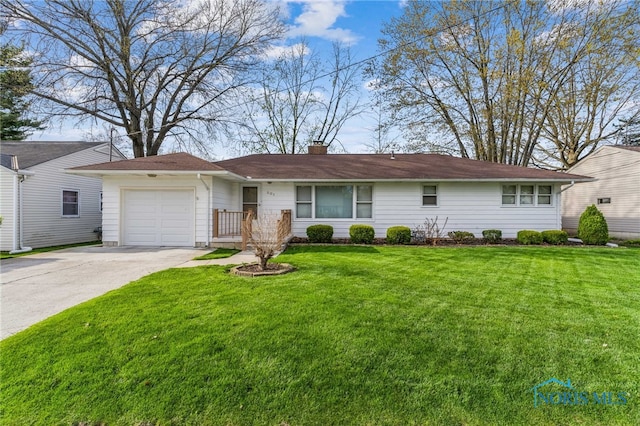 single story home featuring a chimney, a garage, concrete driveway, and a front yard