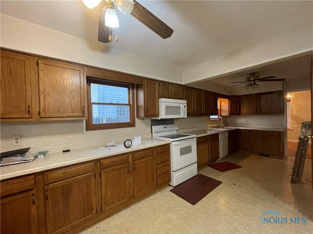 3721 Kershaw Ave, Toledo, OH 43613 - kitchen with white appliances, a ceiling fan, light countertops, and brown cabinets