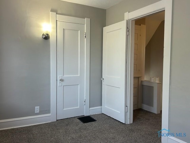 419 Spencer St, Toledo, OH 43609 - unfurnished bedroom featuring visible vents, baseboards, and carpet flooring