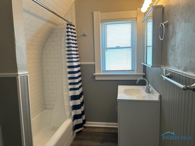 419 Spencer St, Toledo, OH 43609 - bathroom with lofted ceiling, vanity, wood finished floors, and shower / bath combination with curtain